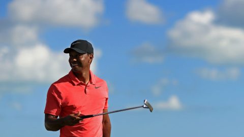 Tiger Woods on palannut hymyilevänä miehenä golfkentille